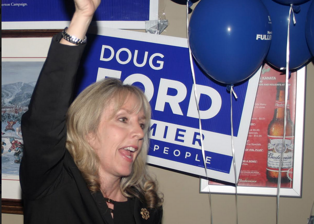 Kanata-Carleton Progressive Conservative candidate Dr. Merrilee Fullerton cheers with her supporters at a Kanata bar, following her election victory on June 7. Photo by Jake Davies