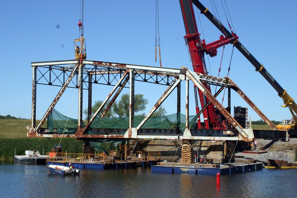Provincial work crews and engineers took the 64-year-old bridge over the Mississippi River down on Friday, Aug. 10, 2018. Photo by Jake Davies
