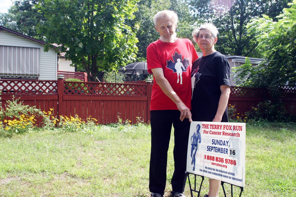 Bob Dupuis and Linda Cassidy pose for a photo in 2018 at their property promoting the Terry Fox run at the time. Photo by Jake Davies