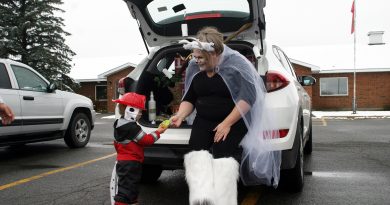 Kinburn's third annual Trunk or Treat was its biggest yet despite Sunday's first snow fall of the year. Photo by Jake Davies