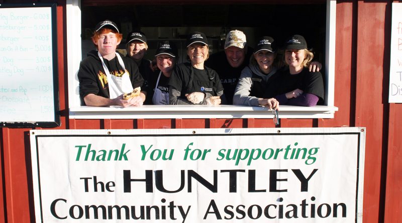 Volunteers pose for a photo at the burger hut.