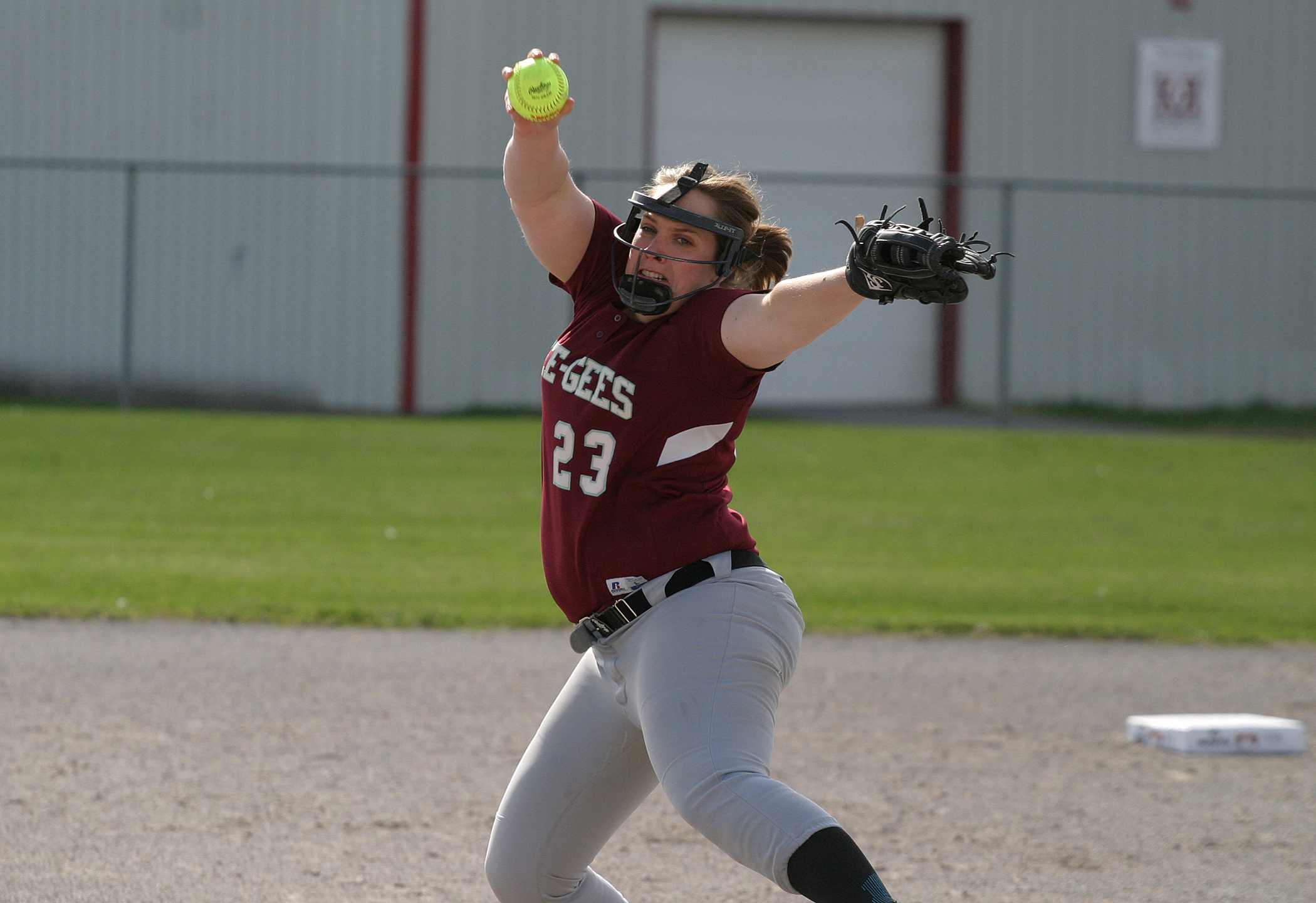 uOttawa Gee Gee Amy Schultz winds up during a game against Laurier at the provincial championship in Carp, Saturday. Photo by Jake Davies