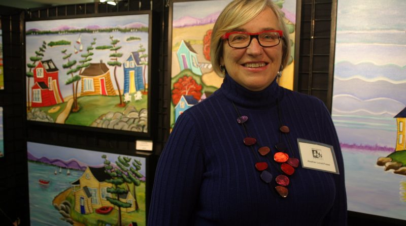 West Carleton Art Society member Heather Lovat-Fraser poses in front of her work at the Expressions of Art 2018 show, Saturday, Oct. 6. Photo by Jake Davies