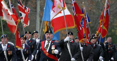 The Branch 616 colour party parades down Allbirch Street on its way to the Legion. Photo by Jake Davies