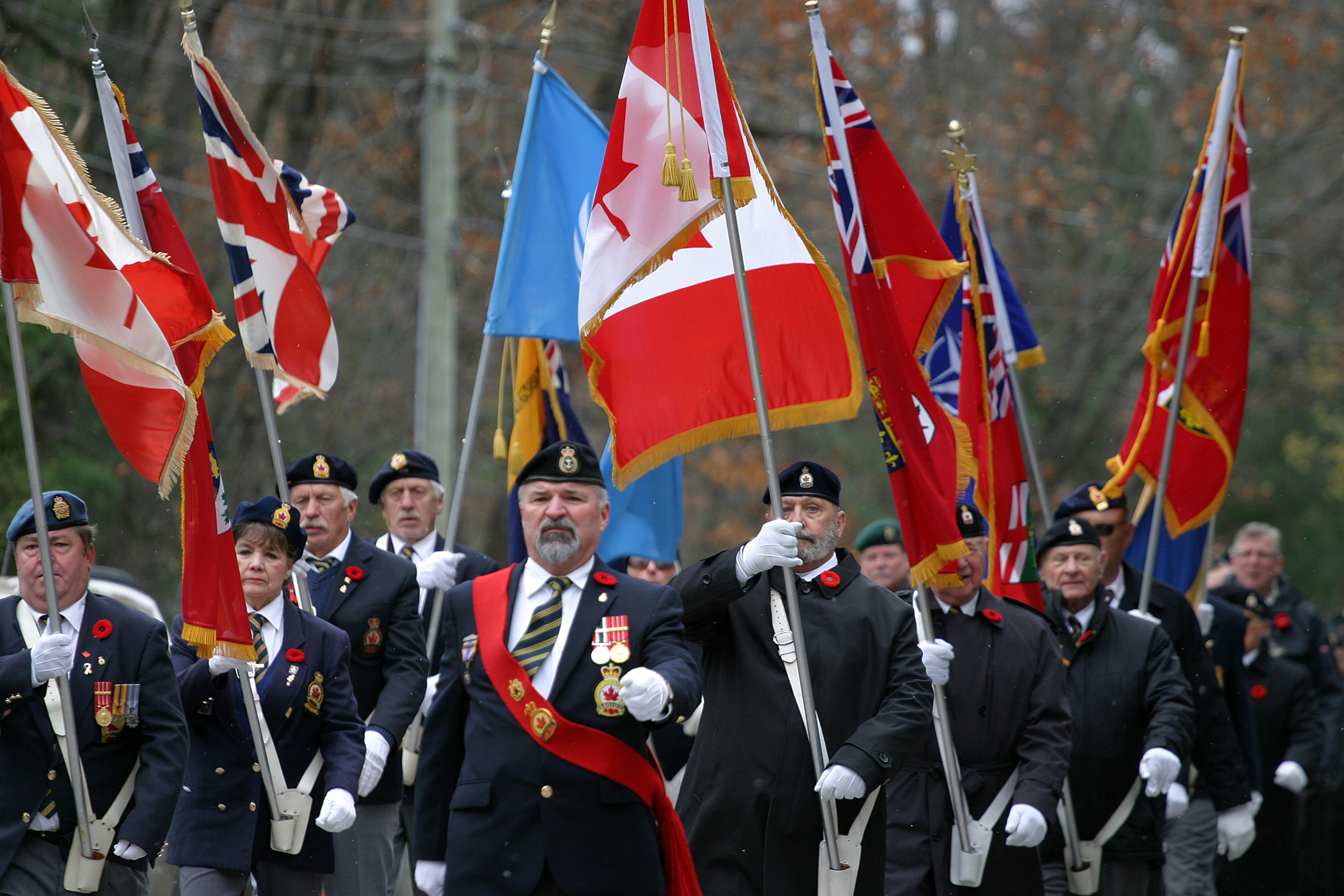 The Branch 616 colour party parades down Allbirch Street on its way to the Legion. Photo by Jake Davies