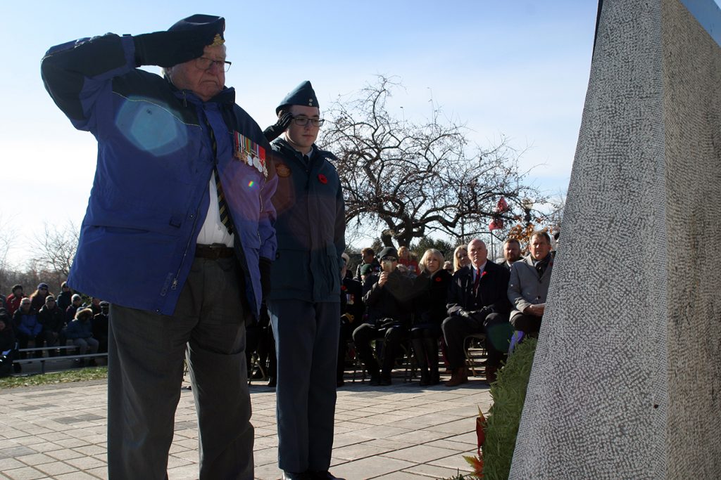 West Carleton's last surviving World War II veteran, Dr. Roly Armitage, salutes at the West Carleton War Memorial at last year's service. Photo by Jake Davies