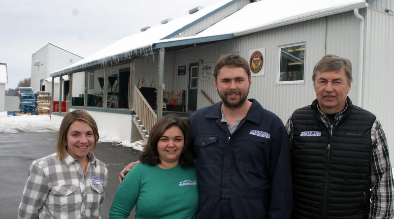 From left, Lisa Shyer, Melissa Herrick, Michael Herrick and John Herrick pose outside Kinburn Farm Supplies. Photo by Jake Davies