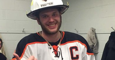 Inferno Captain Nick Sourges was all smiles after being awarded the player of the game by his teammates and getting to wear the cool POG helmet provided by Canadian Safety Products. Courtesy the West Carleton Inferno