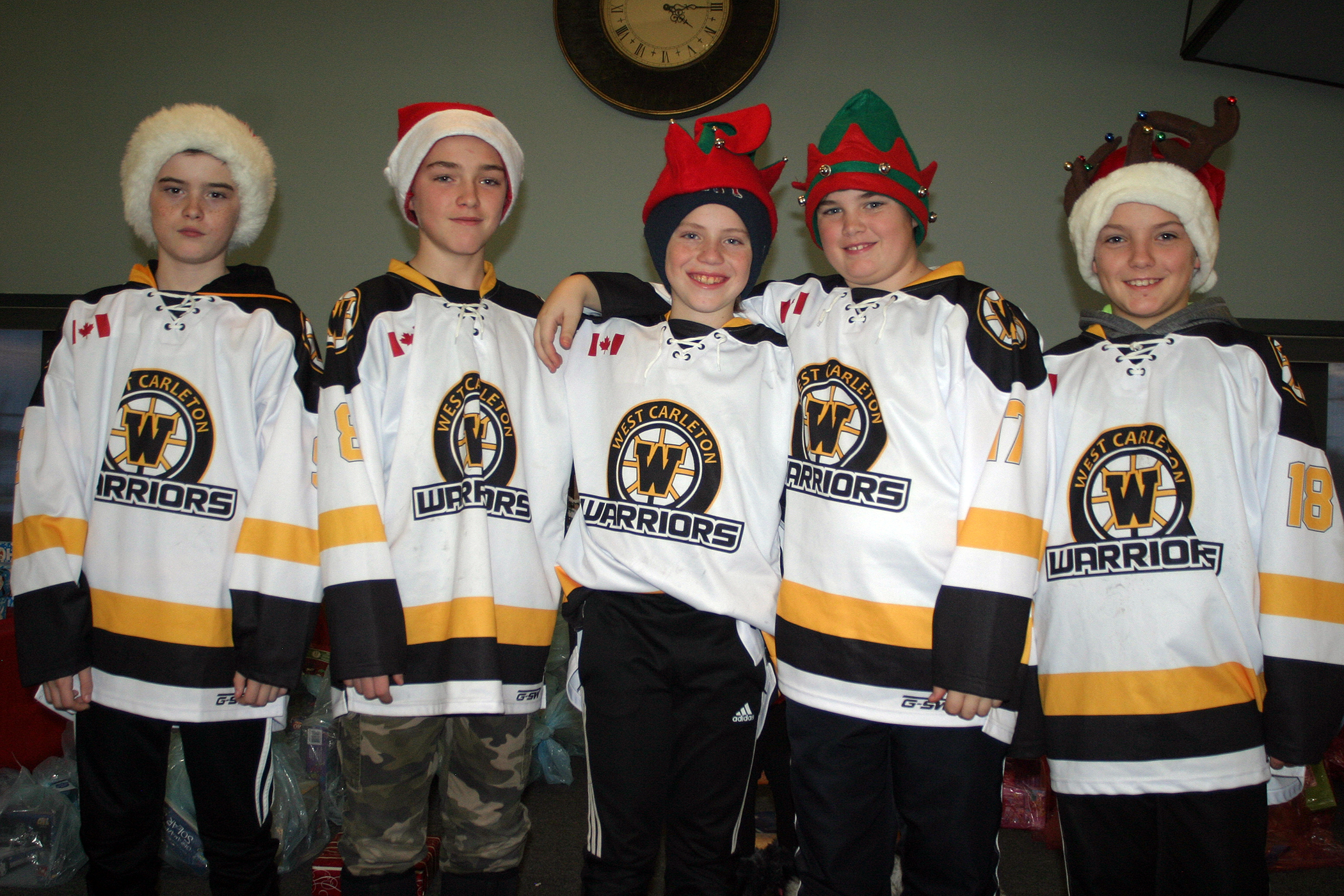 The West Carleton Warriors Pee Wee A team volunteered their time as Santa's elves. Photo by Jake Davies