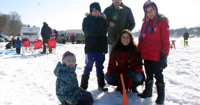 Last year's Kids Ice Fishing Derby had perfect weather for a day on the bay. Photo by Jake Davies