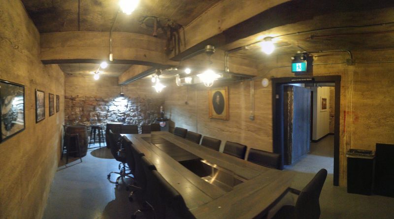 The Vault is a private room available for use in the historic building. The board table is handmade with a cooler in the middle - perfect for keeping your business beers cold. Photo by Jake Davies