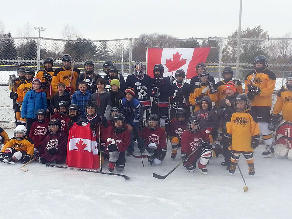 The Fitzroy Harbour Winter Carnival kicks off tonight. This photo is from a previous carnival and shows the WCOHL Fitzroy Harbour teams celebrating Hockey Day in Canada. Photo courtesy FHCA