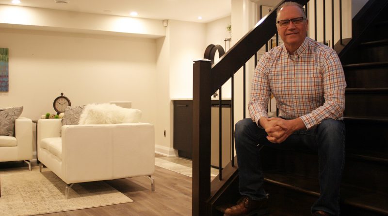 ARTium Design Build Inc. and Just Basements owner Norm Lecuyer in his office's show basement. Photo by Jake Davies