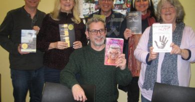Author Michel Weatherall,in front, poses with members of the Carp Creative Writers' Group Wednesday evening. Photo courtesy Carp Branch OPL
