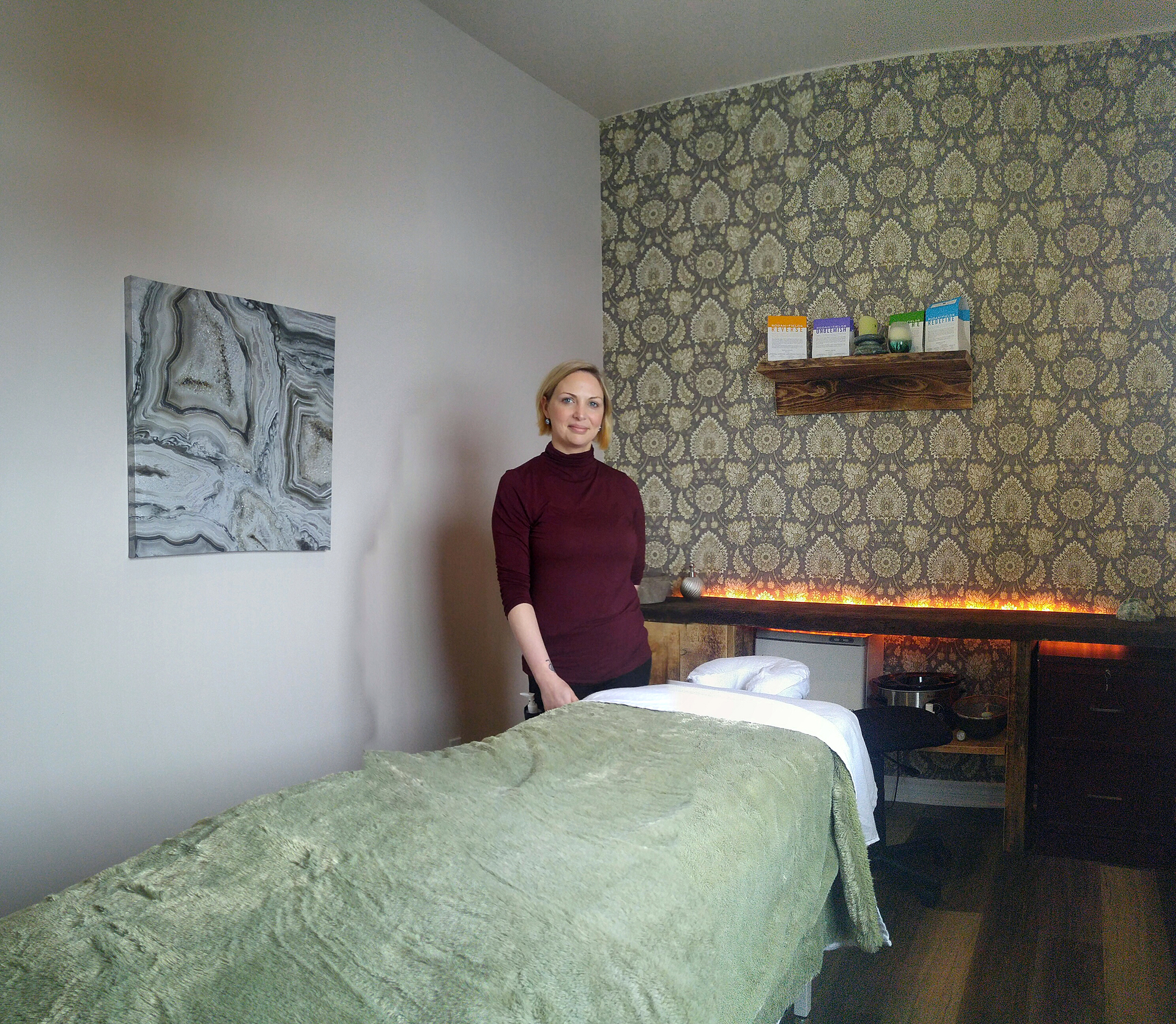 Amanda Foran poses in one of her three new therapy rooms. Photo by Jake Davies