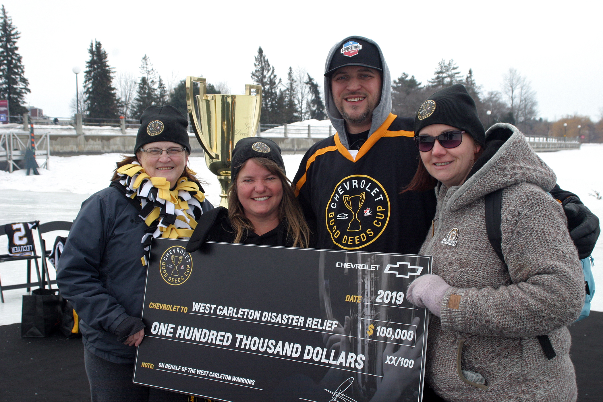 Lori McGrath, Shelley Welsh, Sean Lecuyer and Laurie Chauvin pose with a really big cheque. Photo by Jake Davies