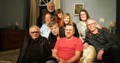 Most of the cast, at their April 10 rehearsal of Bedtime Stories, pose for a photo on set. Photo by Jake Davies