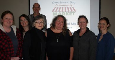 From left, CBCM board members Amanda Chapman, Sylvia Bell (non-voting), Mike Gordon, Suzanne Lee, Melanie Paquette, Jenette Edwards and Amanda Gillespie pose for a photo following the AGM on April 13. Photo by Jake Davies
