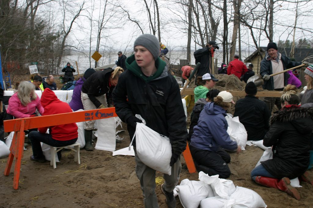 Dunrobin Shores resident Dane Lindhardt-Smith was one of many young volunteers hard at work yesterday. Photo by Jake Davies﻿