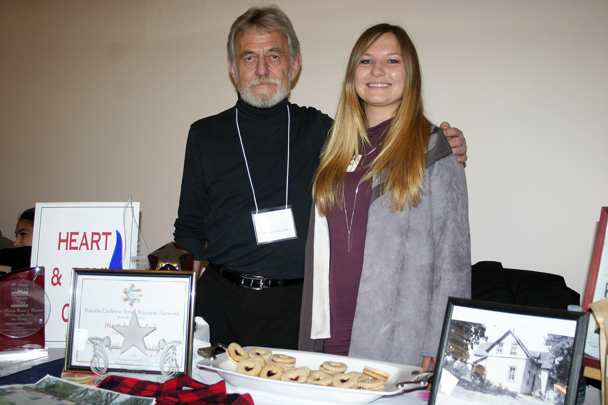 Jim Bowen and Alena Groebner, representing the Heart and Sould Cafe pose for a photo. Photo by Jake Davies