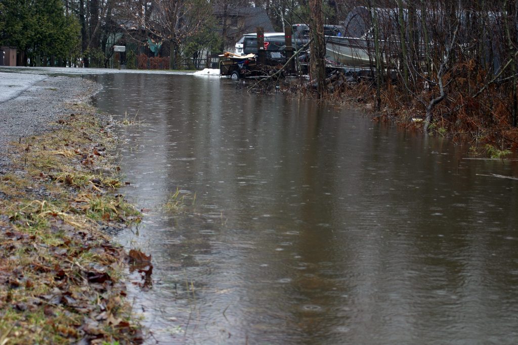 Riverwood Drive in MacLaren's Landing has ditches that can no longer adequatel handle the spring flow. Photo by Jake Davies