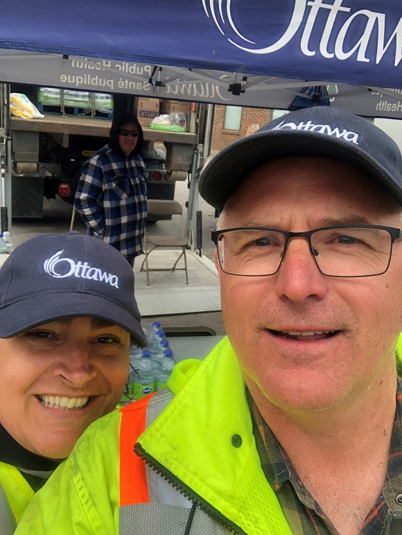 City staff Kimberlee Lambe and Shawn Norman felt welcomed by Constance Bay working at the commodities filling station. Courtesy City of Ottawa