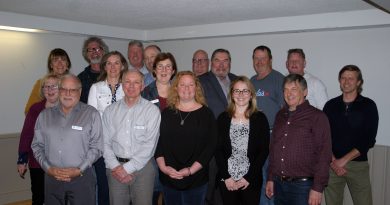 The 2019 Huntley Community Association board poses for a photo after the May 9 annual general meeting. Photo by Jake Davies
