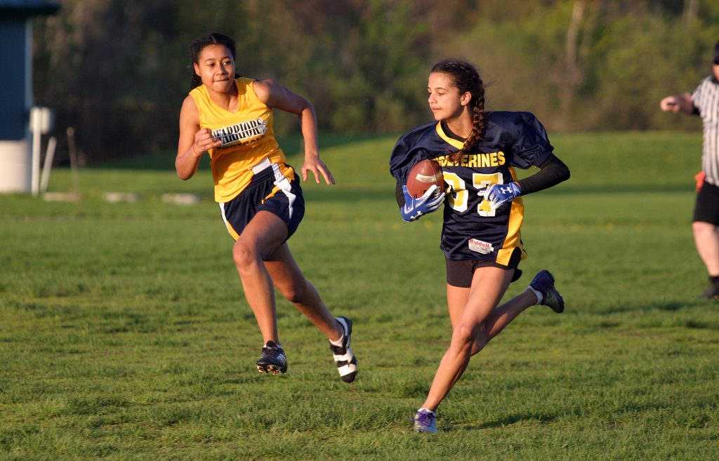 Wolverine Emmy Dorrington picks off a pass during the team's home opener last Friday in Dunrobin. Photo by Jake Davies