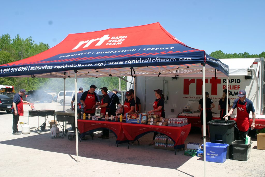 The Rapid Relief Team cooked around 800 burgers and provided hot lunches for volunteers on Saturday. Members of WCDR helped deliver around the ward to all volunteers supporting clean-up duties in West Carleton. Photo by Jake Davies