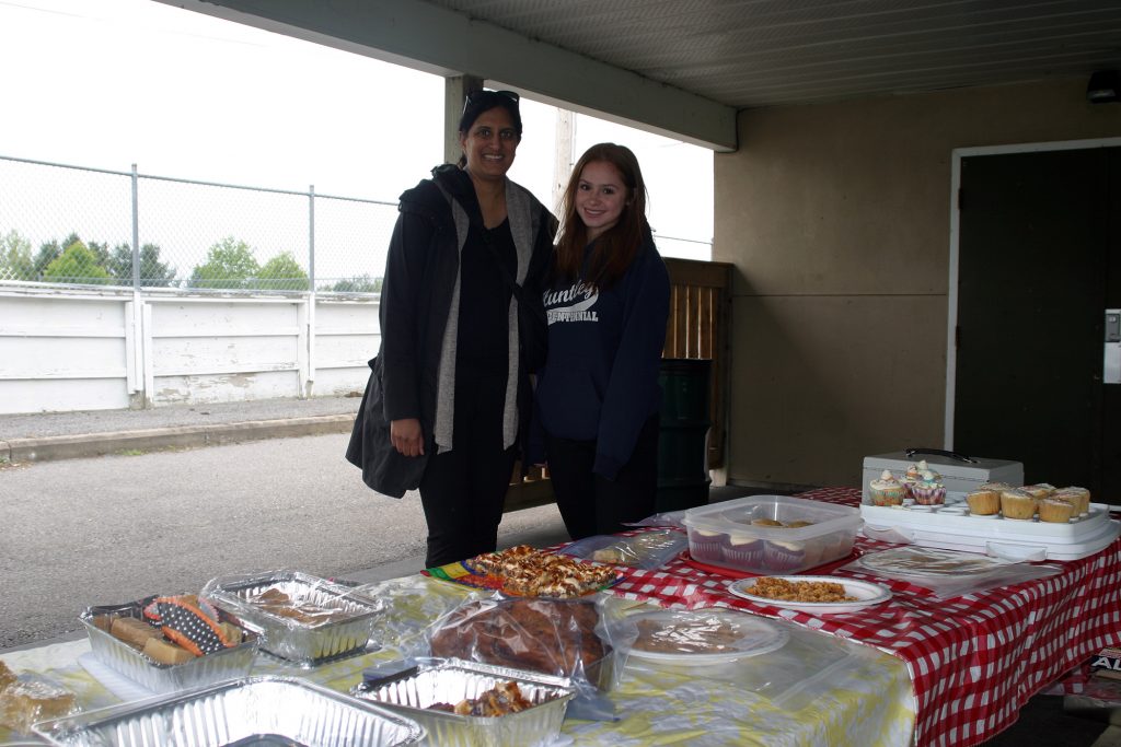 Volunteers Aditi Andruss and Ela St. Michael host the annual Corkery Bake Sale. Photo by Jake Davies﻿