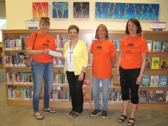From left, Kathy Fischer, librarian Lori Fielding, Bobbi Coady and Karen Ensing. Courtesy the Diefenbooker