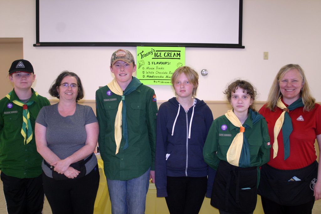 Some of the volunteers at the scouts community sale in Kinburn include, from left, Owen Quinn, Jen Maranta, Simon Ottens, Abigail Elms, Kera Beaudoin and Tammy Smith. Photo by Jake Davies