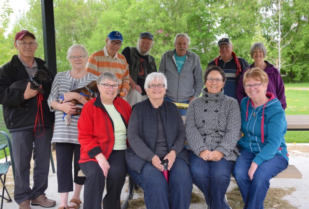   Some of the original residents of Marathon Village dating back to the early 1970s. In the back row, from left, are Les Waddell, Paul Neilson, Bruce Chute, Bob Witt and Debbie Witt. In front is Jim Fraser, Gerrie Fraser, Lois Thompson, Marg Chute, Judith Waddell and Gerry Merkel.  Photo by Shelley Welsh