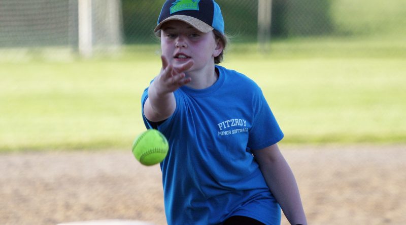 Fitzroy's Sadie Tanguay fires one in in U12 West Carleton Softball Association fastball action during the 2019 season. Photo by Jake Davies
