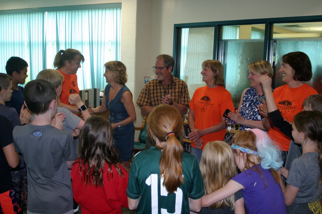 The Diefenbooker's Kathy Fischer presents a cheque to Stonecrest Principal Cindy Alce. Photo by Jake Davies