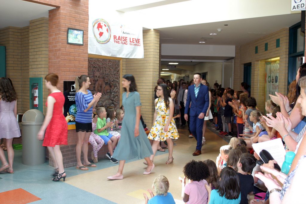 Stonecrest graduates are honoured with a round of applause from every other student and staff in the school in their way in to the auditorium. Photo by Jake Davies