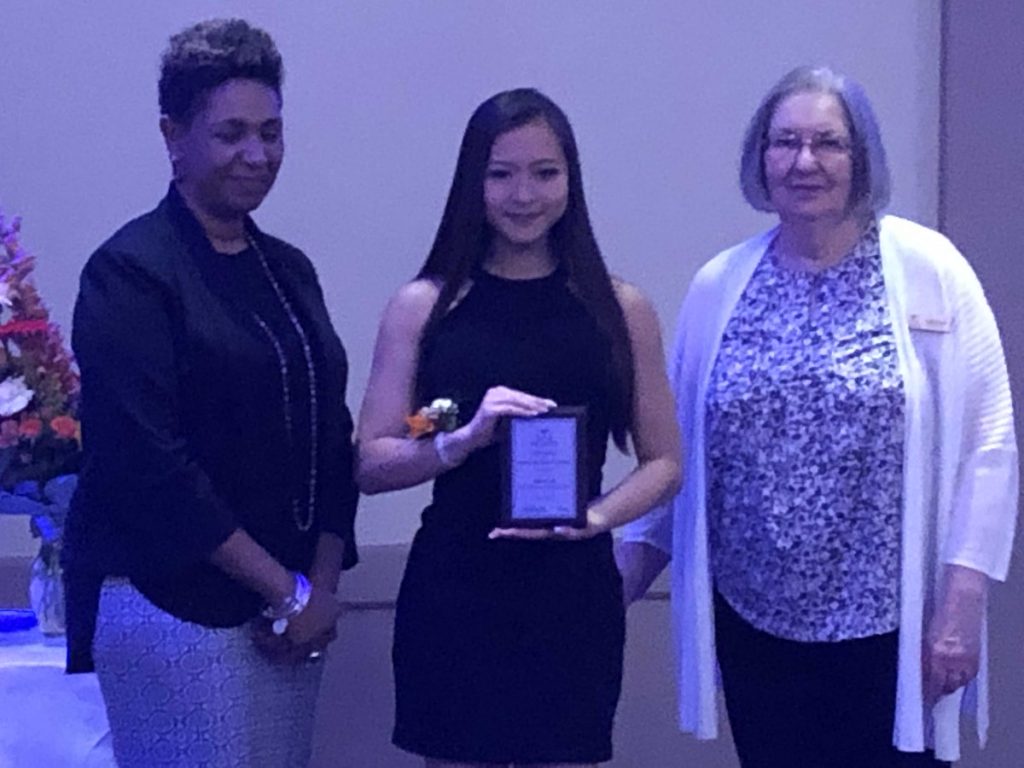 From left, OCDSB Director of Education Camille Williams-Taylor, recipient Sylvia Qi and board chair Lynn Scott. Courtesy WCSS