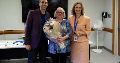 CPDMH board chair Rob Clayton and CEO Mary Wilson Trider congratulate Marg Leblanc. Courtesy CPDMH