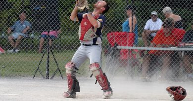 Electric catcher Chris Costello fields a pop fly in a game against the Elkland Beverage Co. during the 2019 Gil Read Memorial Fastball Tournament. Photo by Jake Davies