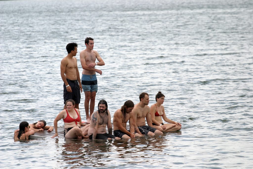 Wakeboard fans kept cool on the raft while taking in Ottawa's first ever wakeboard competition. Photo by Jake Davies