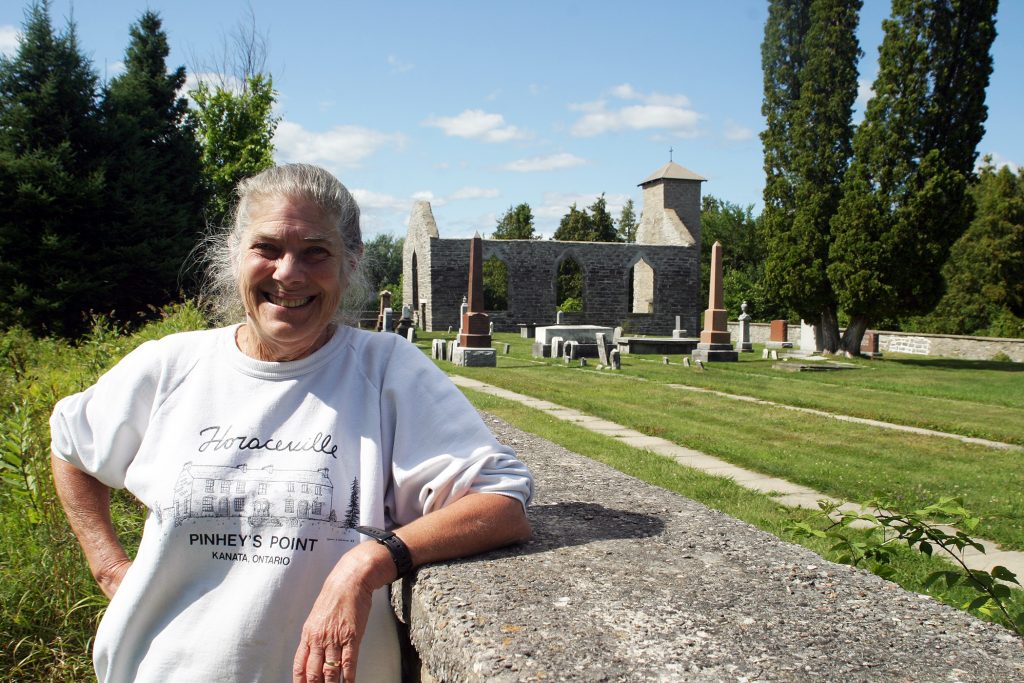 Megs Colbourn, photographed beside the St. Mary's Anglican Church cemetary at Pinhey's Point, is a sixth generation Pinhey. She shared some historic, and a few spooky stories with West Carleton Online last week. Photo by Jake Davies