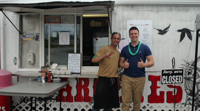 From left, Dave Anderson and Kyler Manseau were serving up grub at Archie's Stuff your Face Fundraiser Sunday, Sept. 15. Photo by Jake Davies