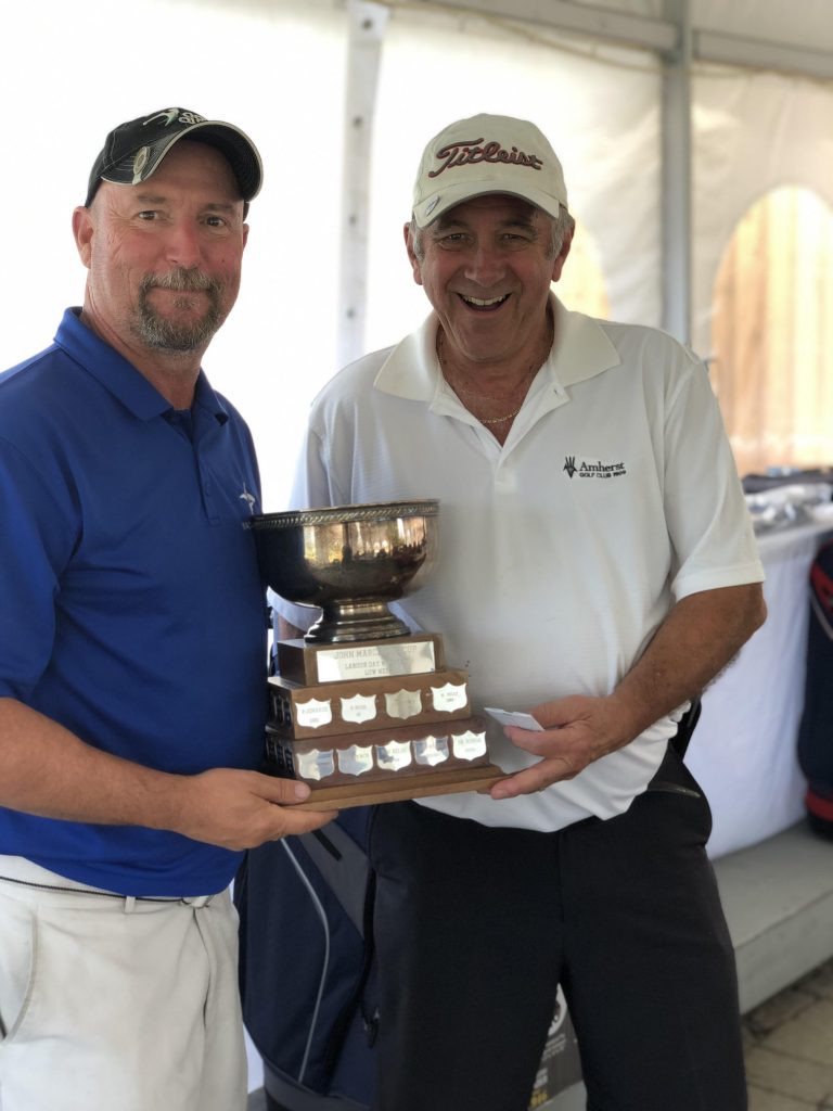 Dave Cormier, right, recieves the low net championship. Courtesy Ken Borg