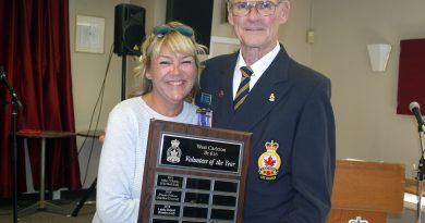 A surprise only to her, Lynda Boland was named Legion Branch 616 Volunteer of the Year during the branch's Legion Week Honours and Awards Ceremony Sept. 15. Branch President George Dolan made the presentation to Garden Gal. Photo by Jake Davies