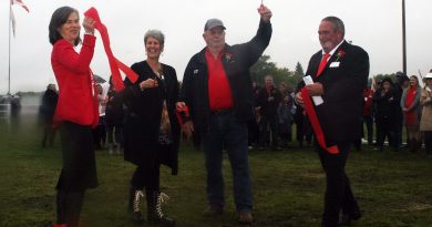 From left, 2019 Homecrafts President Martha Palmer, past president Laura Campbell (2007), past president Lorne Montgomery (1989) and Agriculture President Doug Norton cut the Carp Fair ribbon at today's ceremonial parade. Photo by Jake Davies