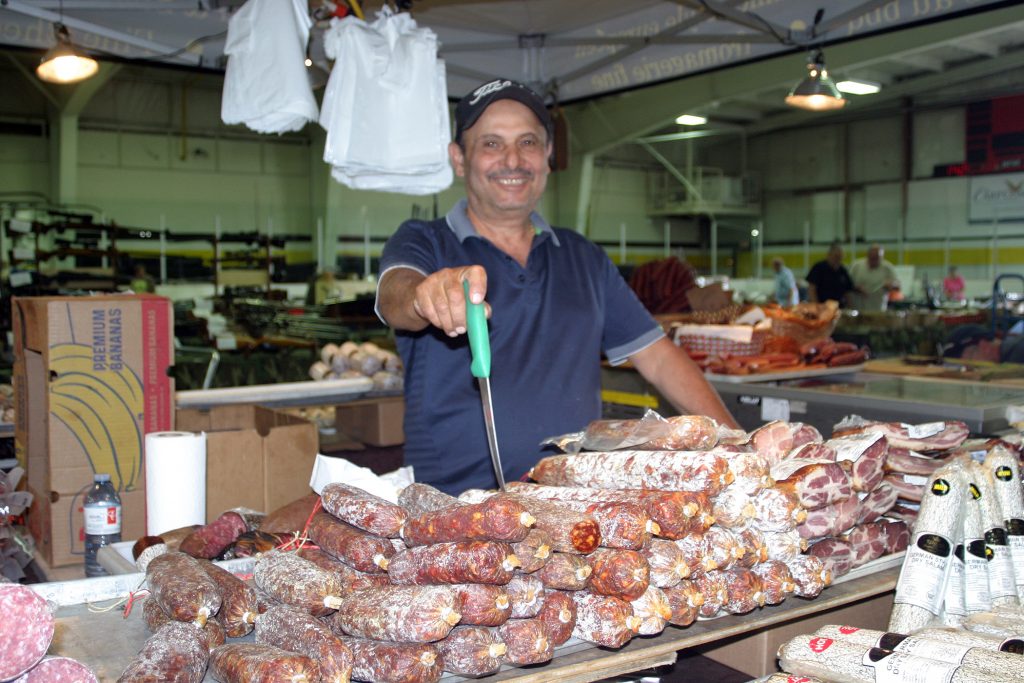 West Carleton Online's camera was more focused on the delicious meat at T.J. Meats' booth then Tony Demari. Demari, from Mississauga, says he has brought his smoked and cured meats and domestic and imported cheeses to shows in Quebec and Ontario this year. Photo by Jake Davies