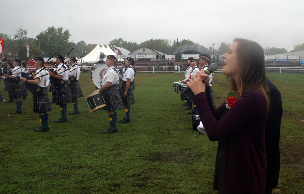 Emily Palmer sings O Canada. Photo by Jake Davies