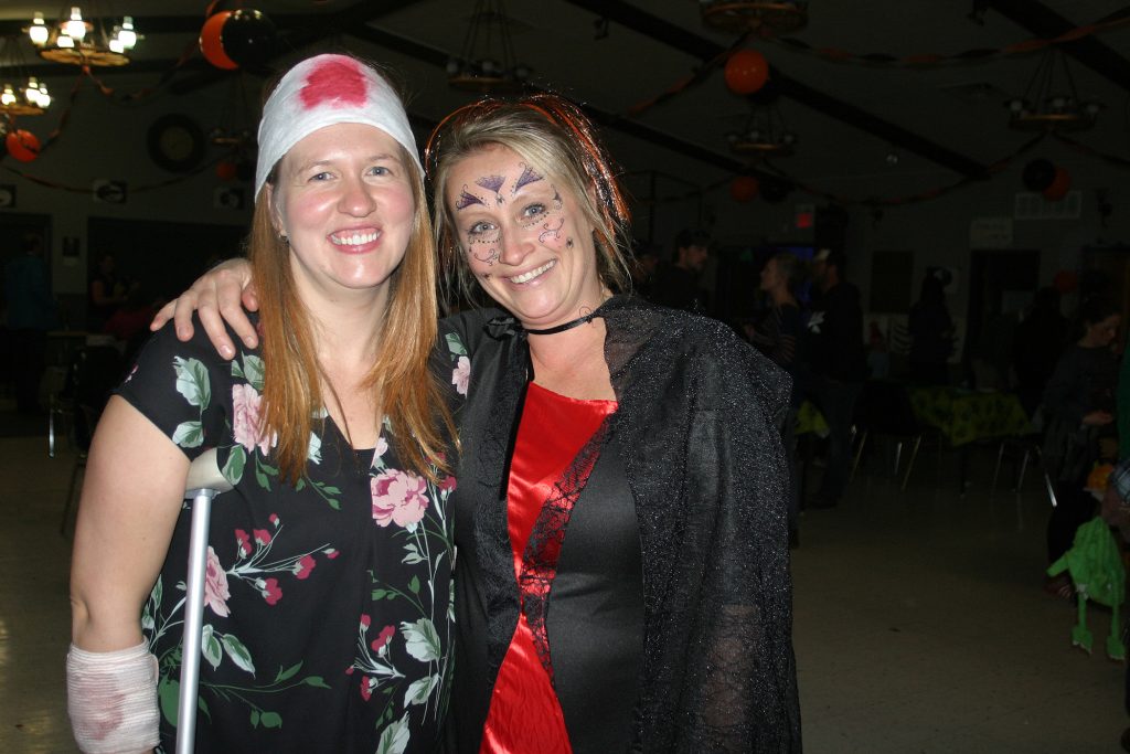 Fitzroy Harbour Hallowe'en Party organizers Kim Heydt and Anna Hutchinson pose for a photo. Photo by Jake Davies﻿