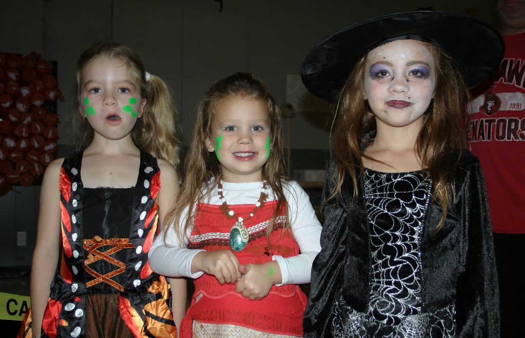 From left, Fitzroy Harbour's June Foreman, 6, Everleigh Istead, 4, and Emersyn Istead 6 are party people. Photo by Jake Davies﻿