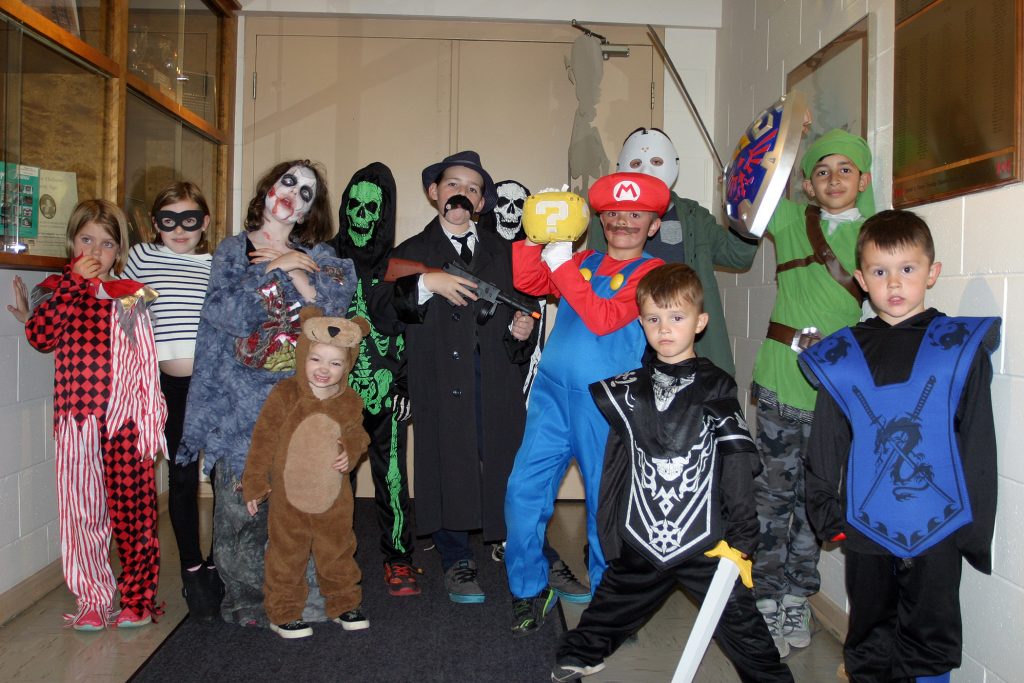 A boatload of costumed Kinburn kids pose for a photo at the Kinburn Hallowe'en Dance Saturday night. Photo by Jake Davies